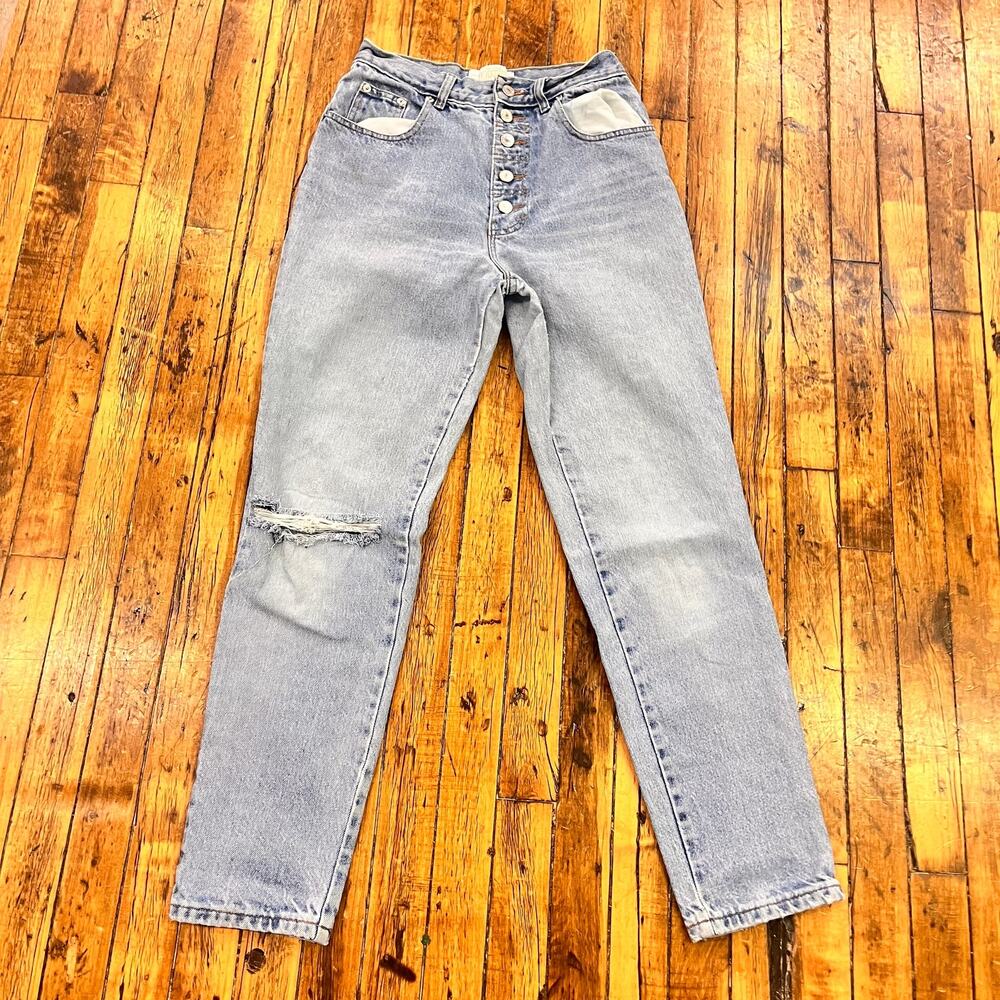 vintage women's high waist button fly light wash tapered leg denim jeans